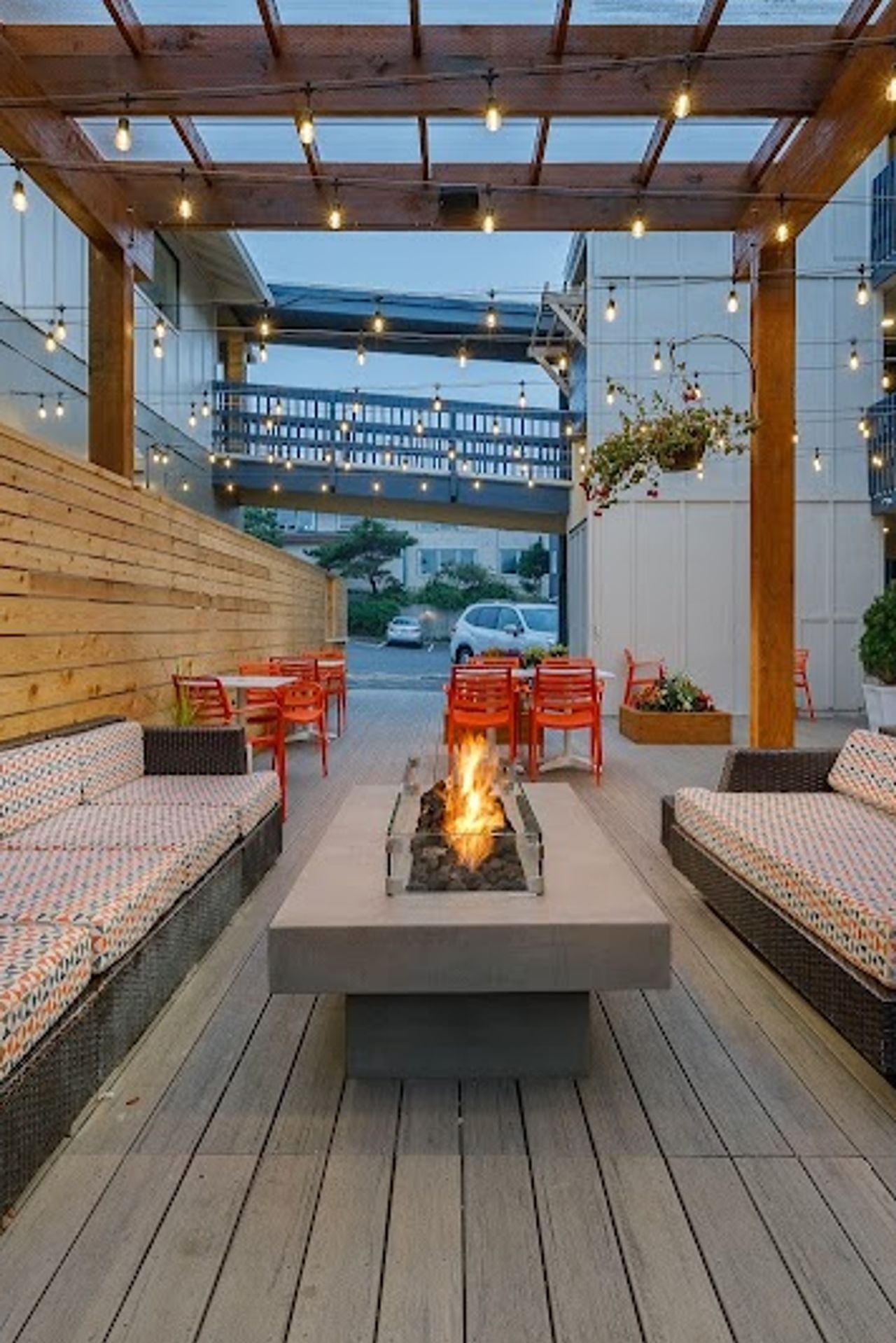 Photo of Surfland Hotel - Outdoor seating area with firepit