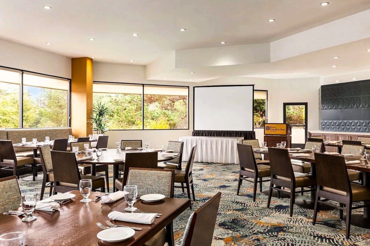 Photo of Hilton Garden Inn Monterey - Pacific Grille, hearty breakfast buffet with eggs, fresh fruit, and pastries