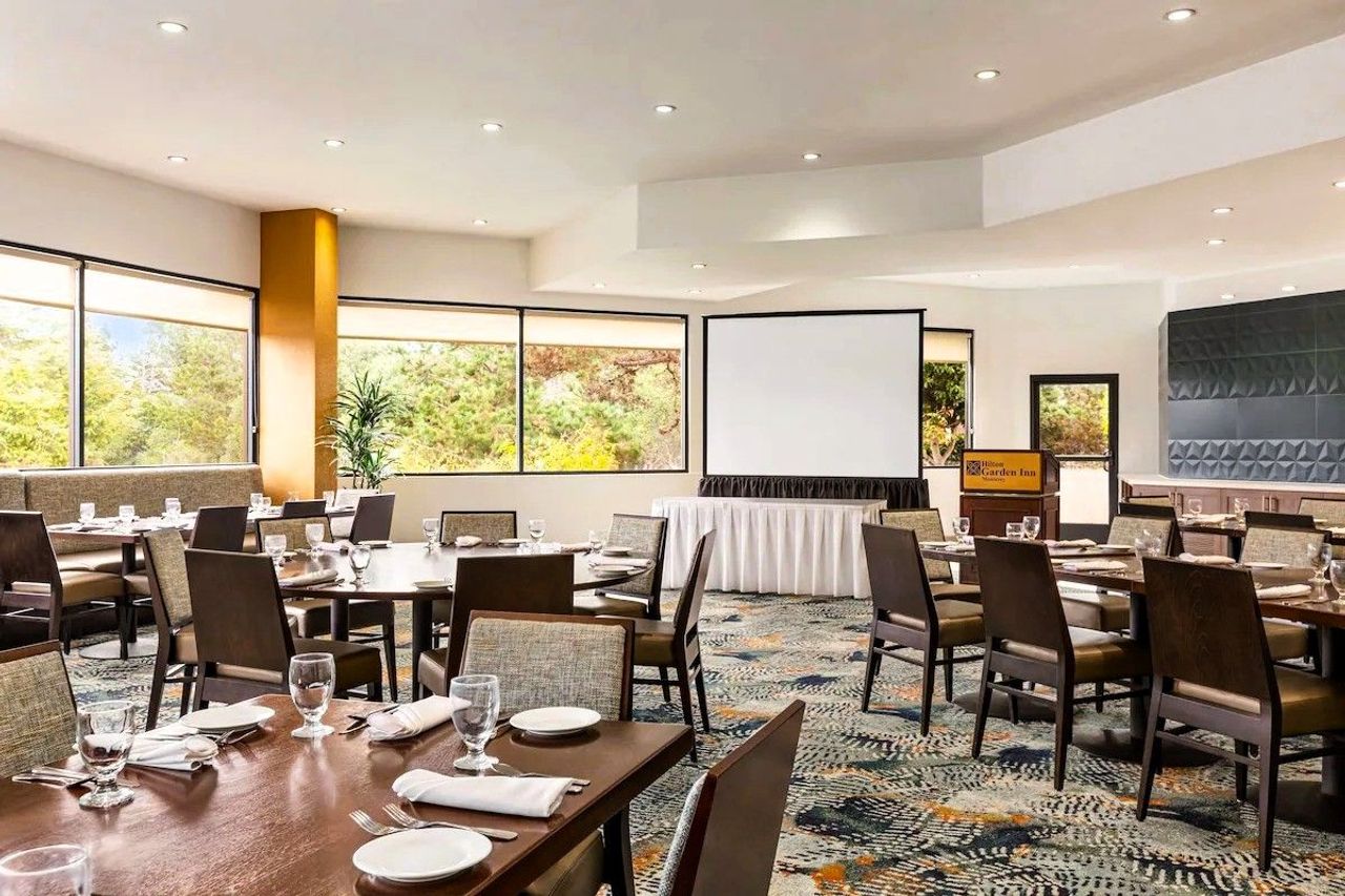 Photo of Hilton Garden Inn Monterey - Pacific Grille, hearty breakfast buffet with eggs, fresh fruit, and pastries