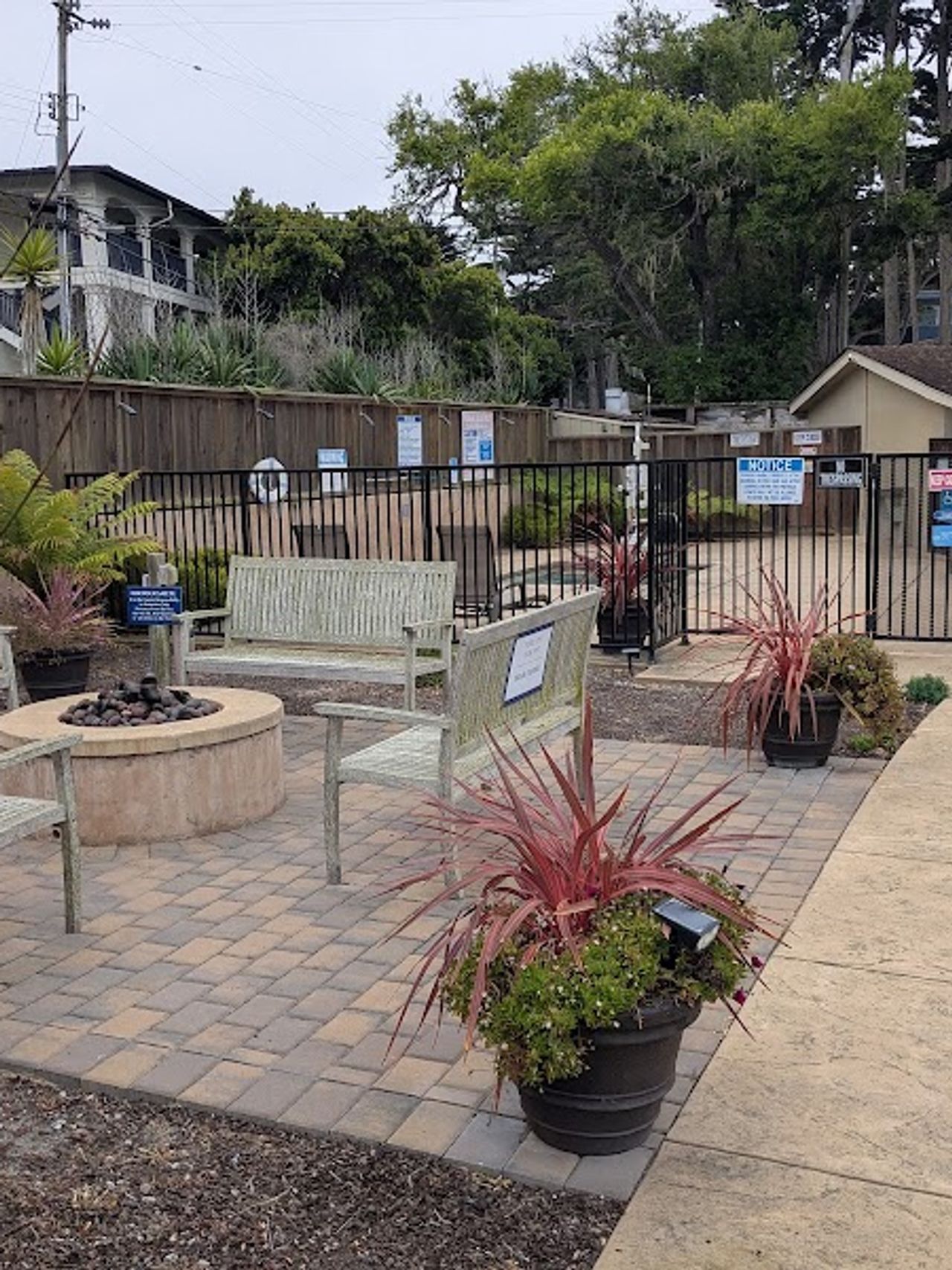 Photo of Monterey Peninsula Inn - Outdoor seating area, firepit