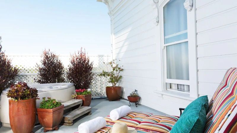 West Cliff Inn, A Four Sisters Inn - Fenced private deck with seating area and an outdoor hot tub