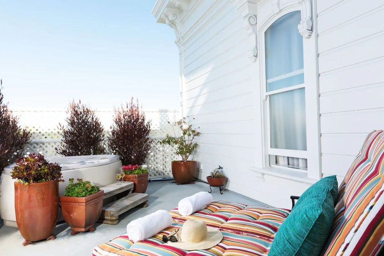 West Cliff Inn, A Four Sisters Inn - Fenced private deck with seating area and an outdoor hot tub