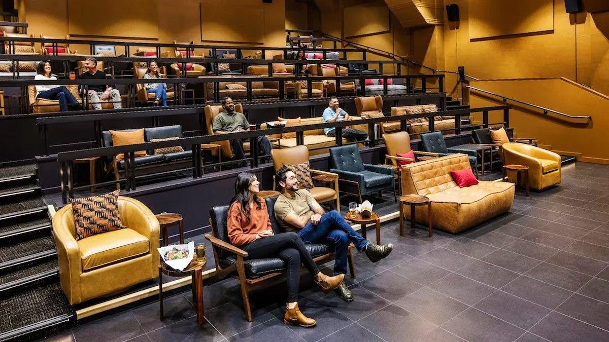 El Capitan Hotel - Cinema with tiered seating and comfortable sofas and armchairs