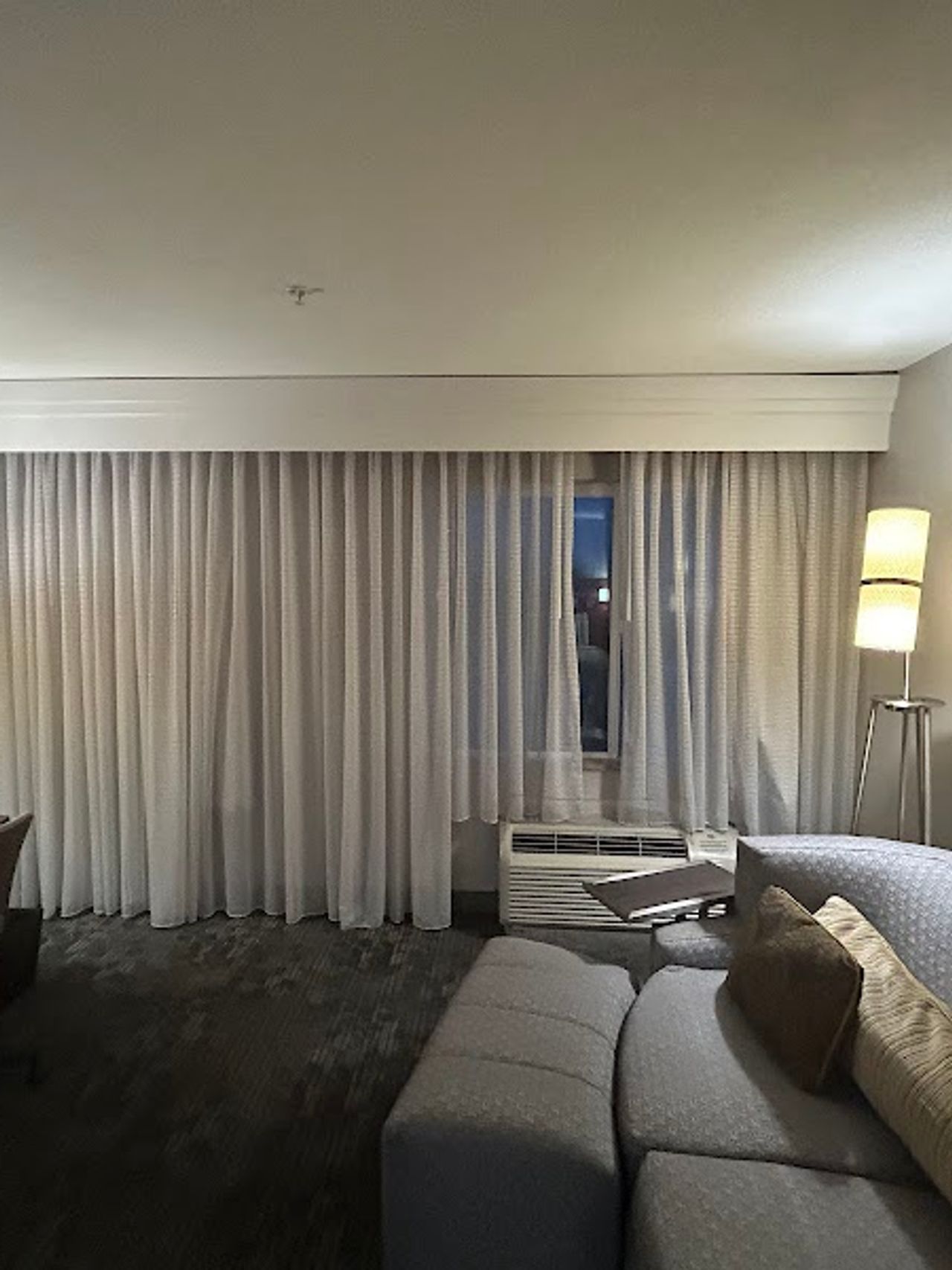 Photo of Courtyard Merced - Suite with comfortable sofa set, armchair, and desk for work or dining