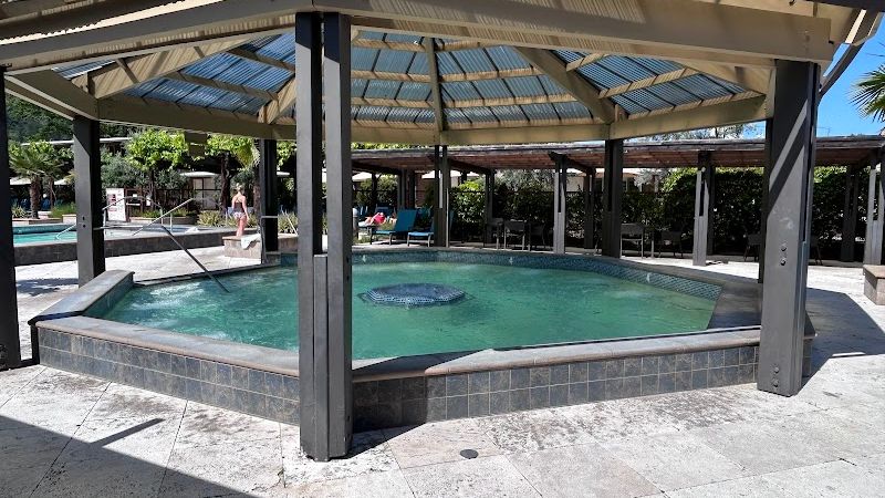 Photo of Calistoga Spa Hot Springs - Adults-only Jet Pool with Jacuzzi jets beneath a covered pavilion