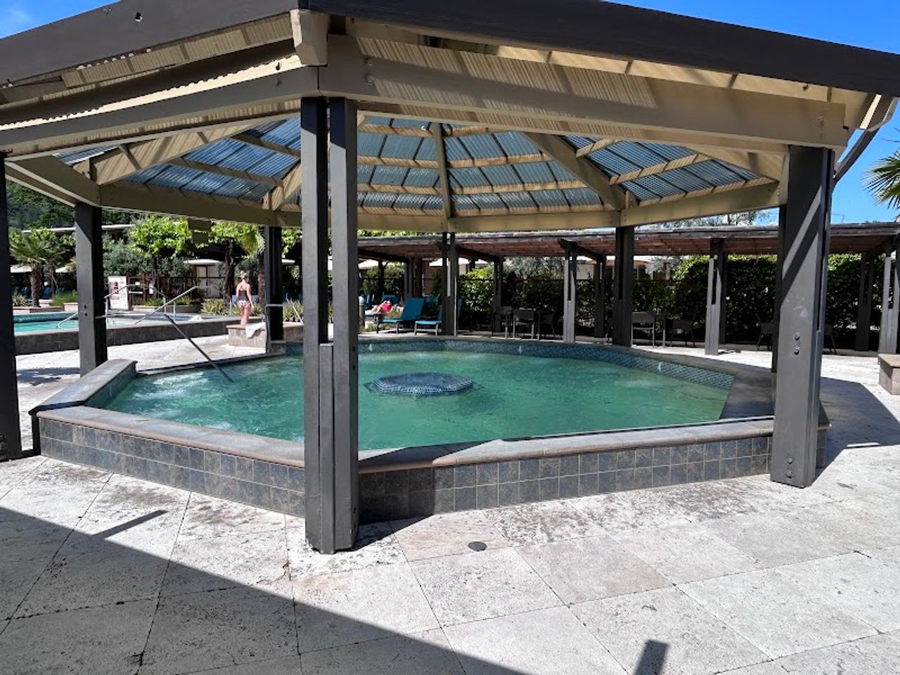 Photo of Calistoga Spa Hot Springs - Adults-only Jet Pool with Jacuzzi jets beneath a covered pavilion