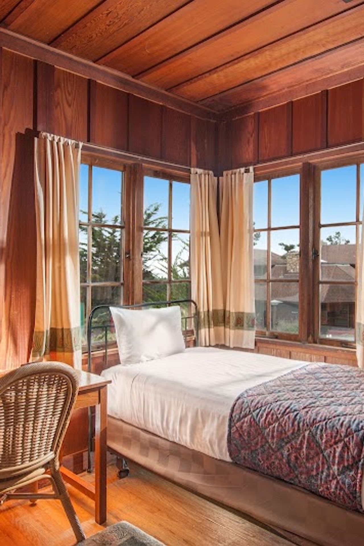 Photo of Asilomar Hotel and Conference Grounds - Historic Room with hardwood floors and beautiful rustic California furnishings