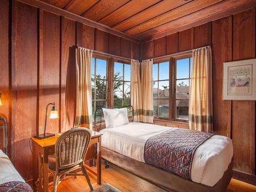 Photo of Asilomar Hotel and Conference Grounds - Historic Room with hardwood floors and beautiful rustic California furnishings