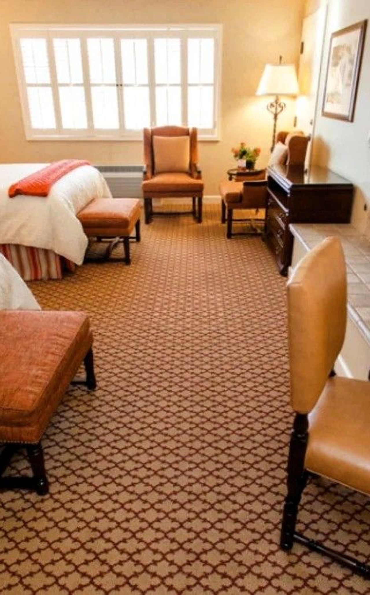 Photo of Casa Munras Garden Hotel & Spa - Deluxe Queen Queen With Fireplace, two queen beds, granite bathroom, USB ports, Keurig coffee maker, and a work desk, flat TV