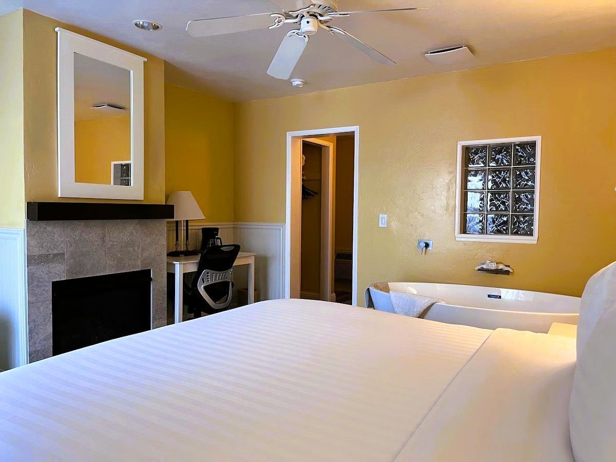 Photo of Monterey Bay Lodge - King fireplace room with in-room spa soaking tub