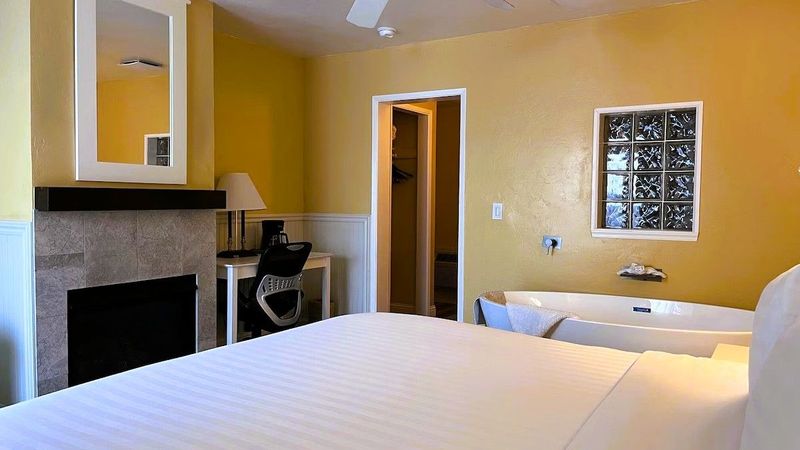 Photo of Monterey Bay Lodge - King fireplace room with in-room spa soaking tub