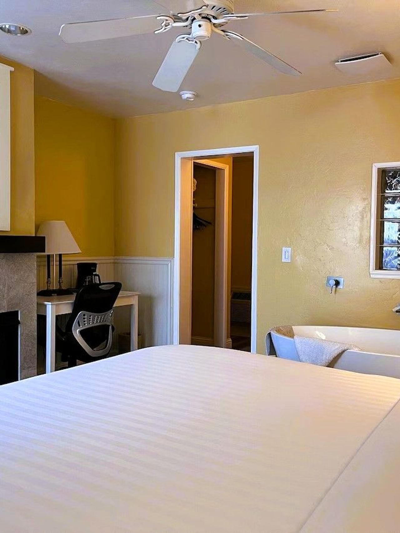 Photo of Monterey Bay Lodge - King fireplace room with in-room spa soaking tub