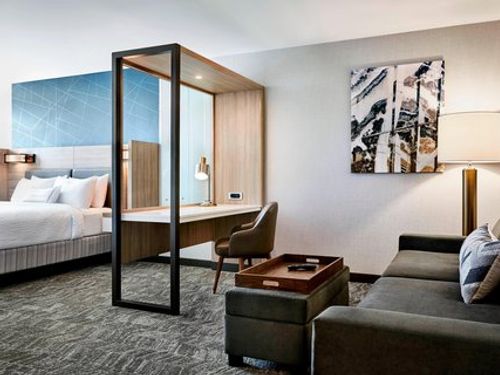 Photo of SpringHill Suites Turlock - Suite, King Bed, Seating Area