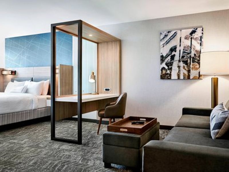 Photo of SpringHill Suites Turlock - Suite, King Bed, Seating Area