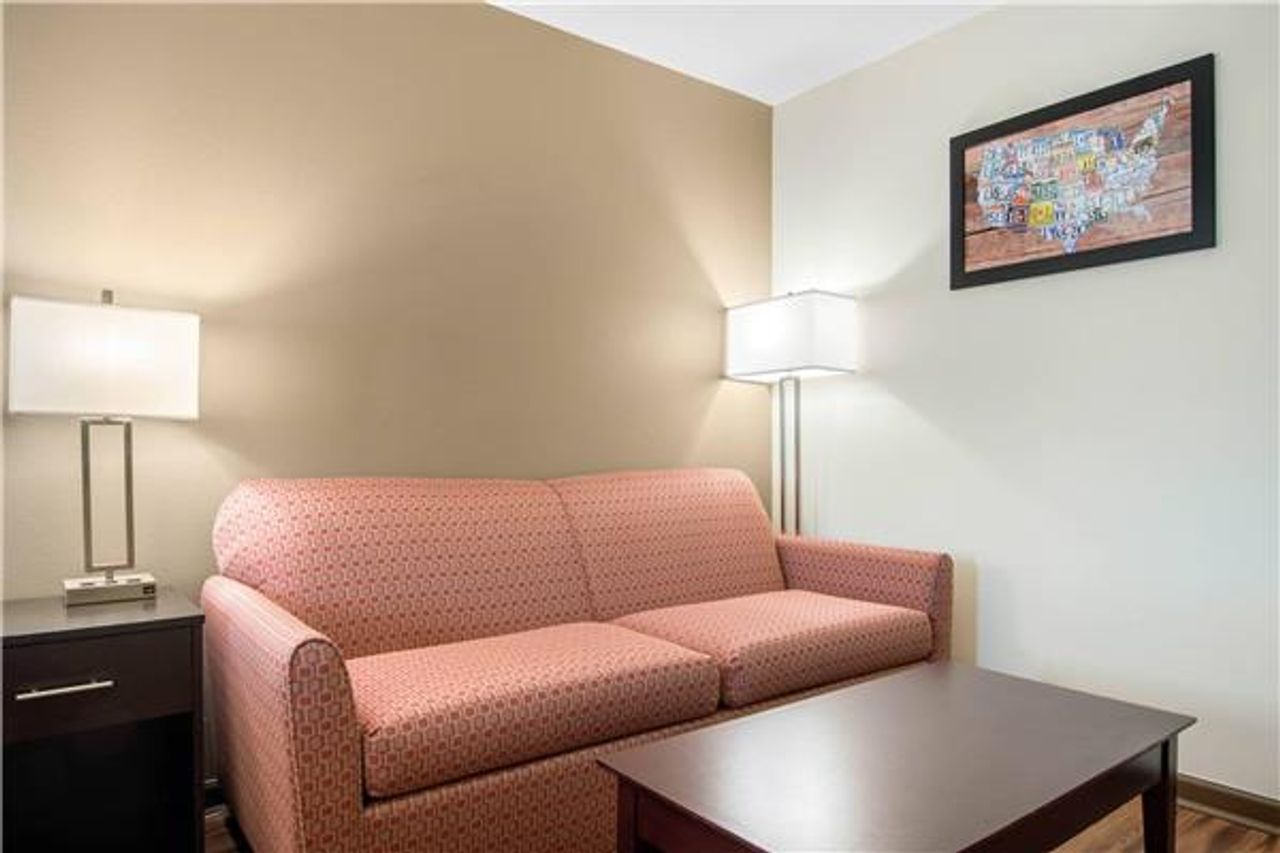Photo of Econo Lodge Inn & Suites Springfield Main Street - Room, Sofa, Seating area