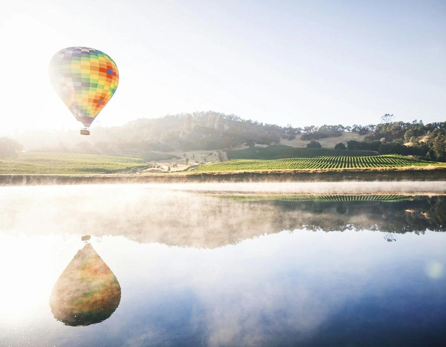 Hot air balloon floating in mid air above Napa Valley, Napa, California, USA