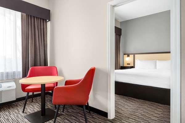 Photo of Ramada by Wyndham Marina - Suite, Separate Bedroom, Living Area