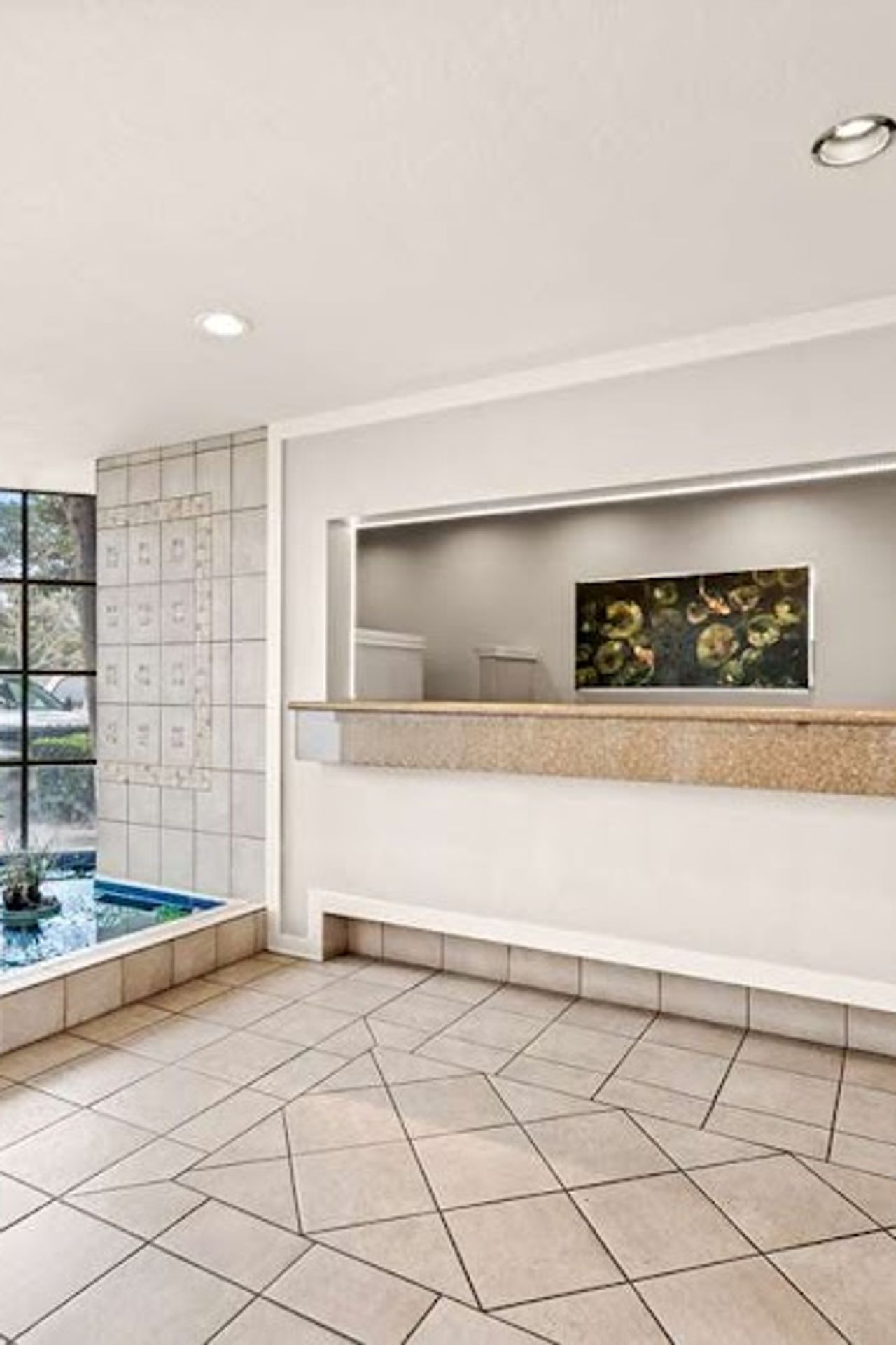 Photo of Best Western De Anza Inn - Lobby, Reception, Indoor Koi Pond