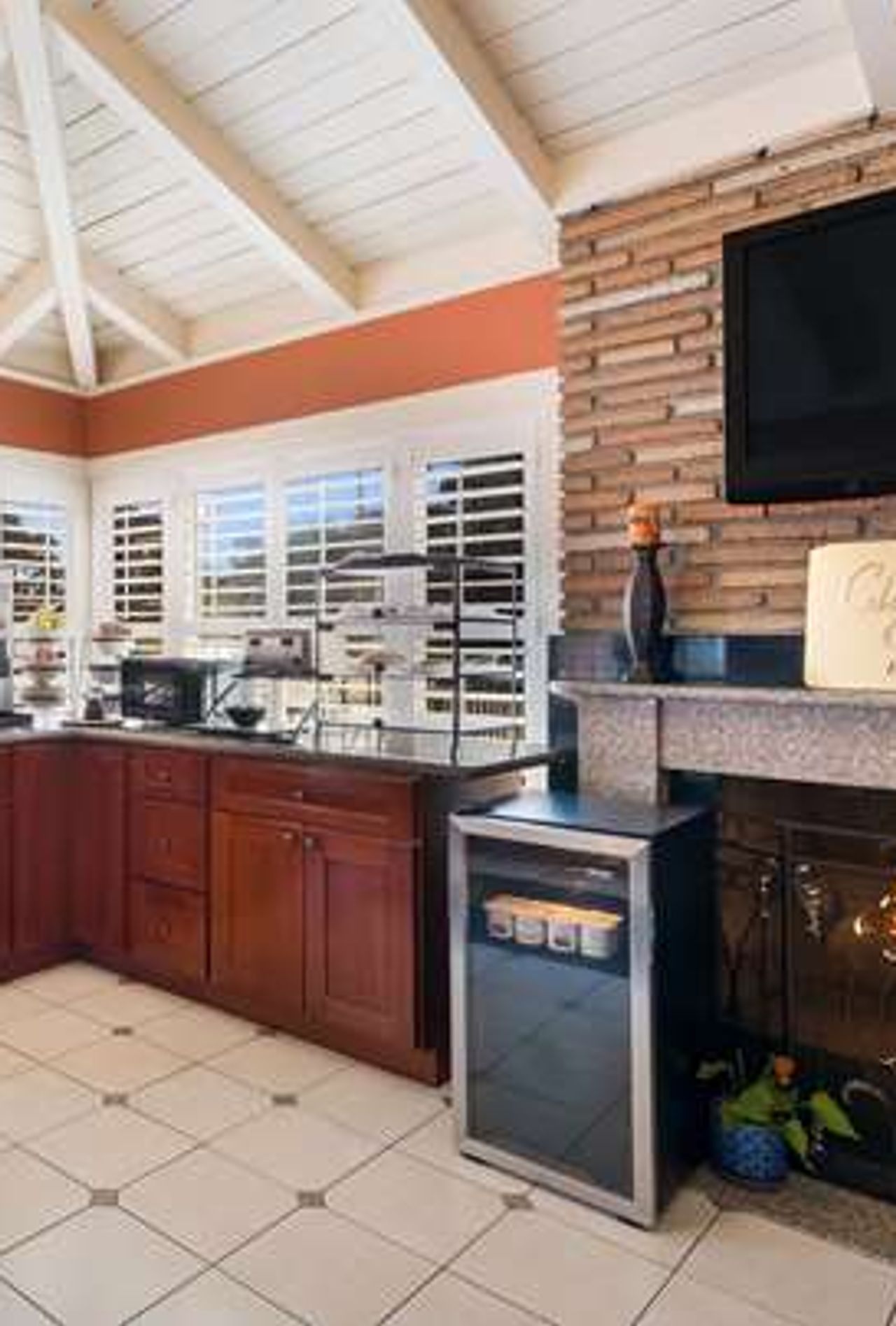 Photo of Clarion Collection Wilkie's Inn Pacific Grove - Monterey - Lobby, fireplace, coffee, tea, flatscreen TV