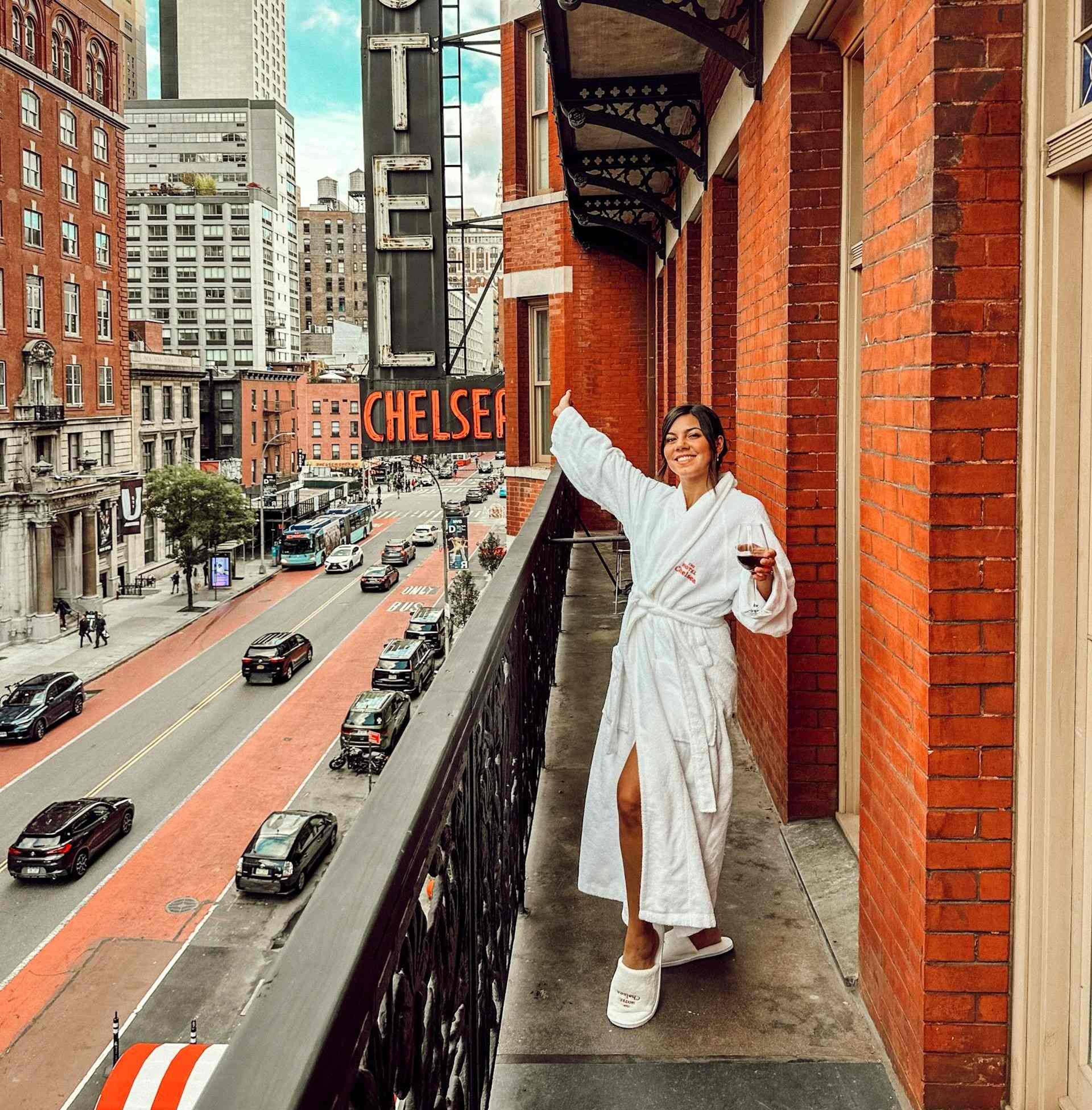 Woman on a Balcony in Hotel Chelsea in New York