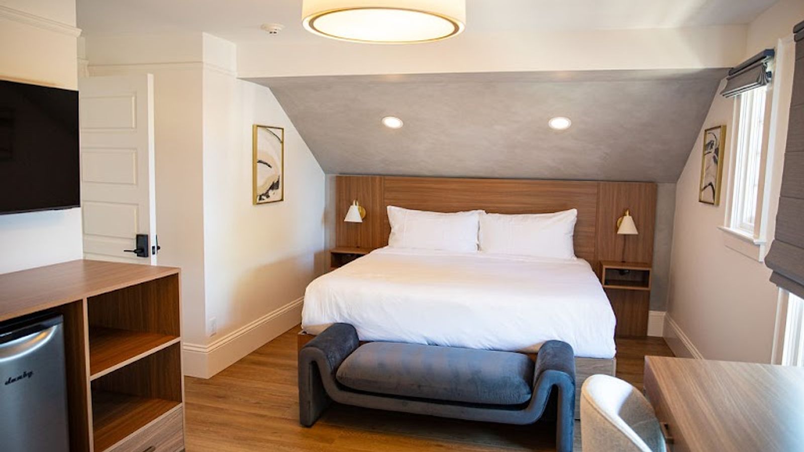 Photo of the compass mcminnville - West suite: 2ND FLOOR* KING SUITE, MOODY PRIVATE BATHROOM WITH A SPACIOUS WALK-IN SHOWER, LOUNGING AREA, WORKING STATION