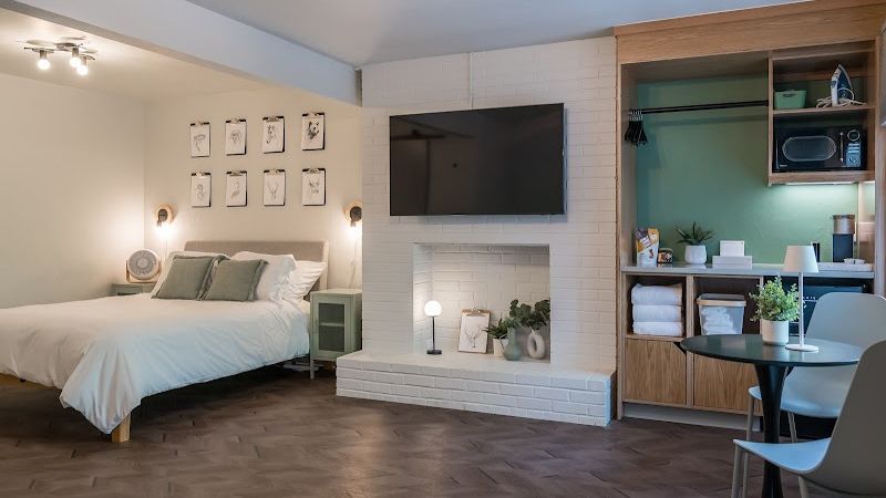 Photo of The Local Motel - Room, King bed, Flat TV, Coffee Table