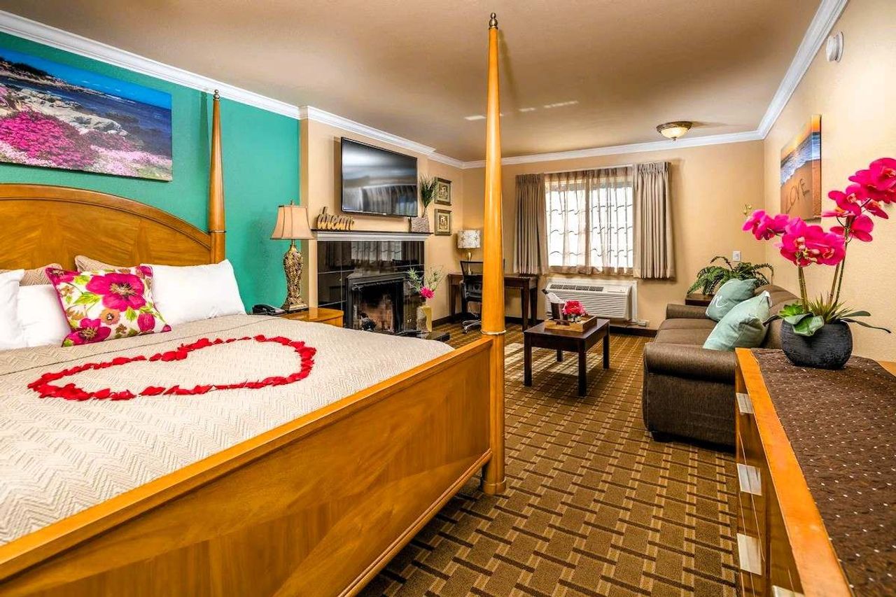 Photo of Stage Coach Lodge Monterey - King Honeymoon Suite, King Bed, Fireplace, Separate Seating Area