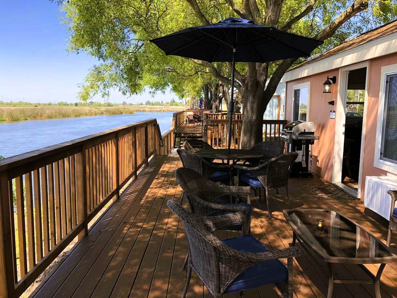 Photo of Village West Marina & Resort - "Waterfront" Bungalow - Terrace, Outdoor seating area, Gas BBQ grill with included propane