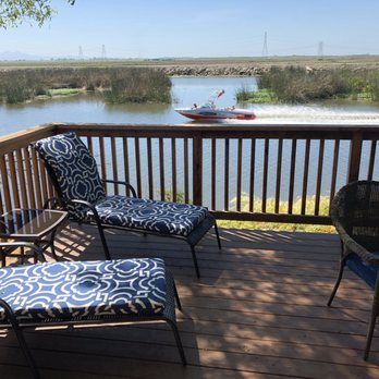 Photo of Village West Marina & Resort - "Delta" Bungalow - furnished terrace that feels like an outdoor living room