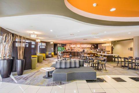 Photo of Courtyard Merced - unique bar area with plush seating 