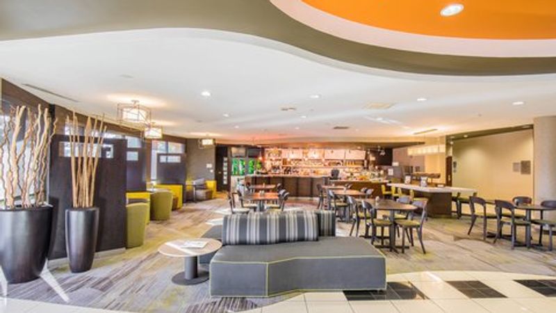 Photo of Courtyard Merced - unique bar area with plush seating