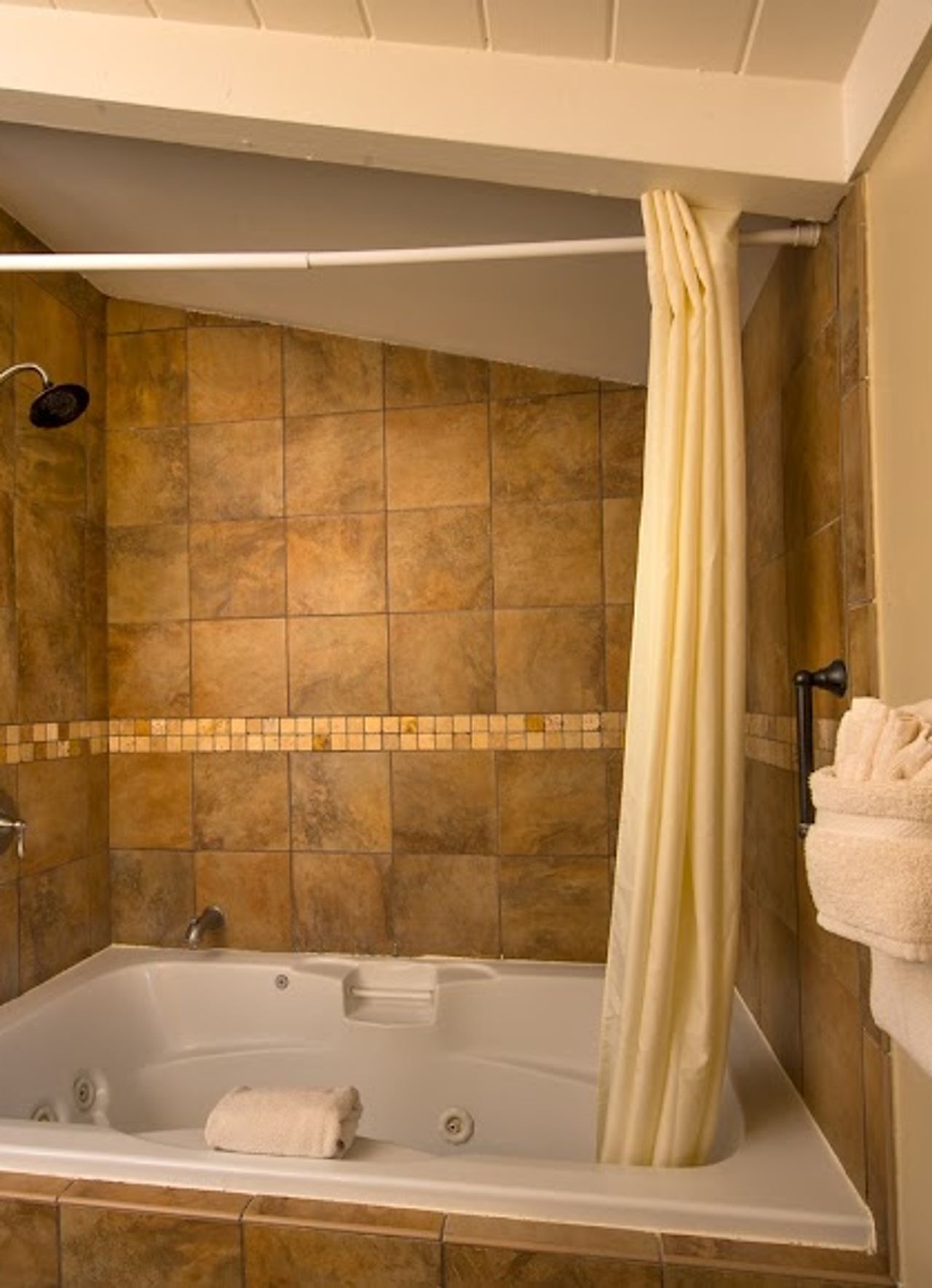 Photo of Sunset Inn - Bathroom with Jacuzzi in the Premium King with Full Kitchen