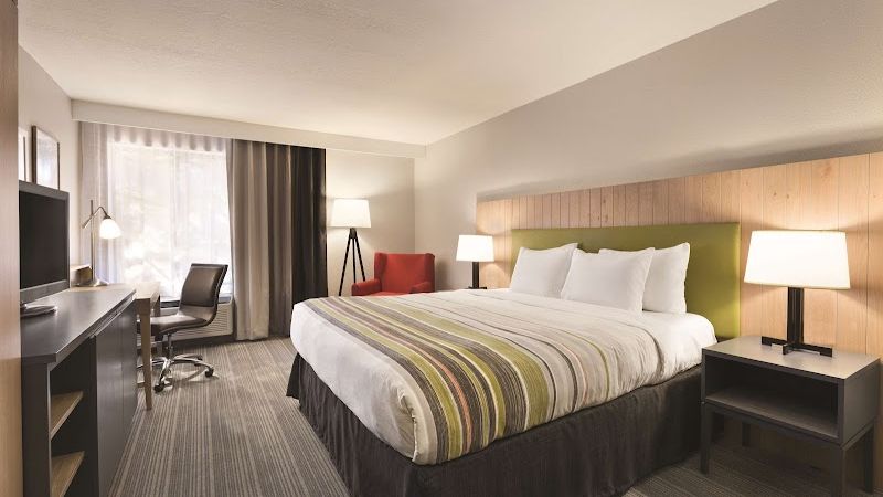 Photo of Country Inn & Suites by Radisson, Monterey Beachfront-Marina, CA - Room, King Bed, Work Desk, Flat TV