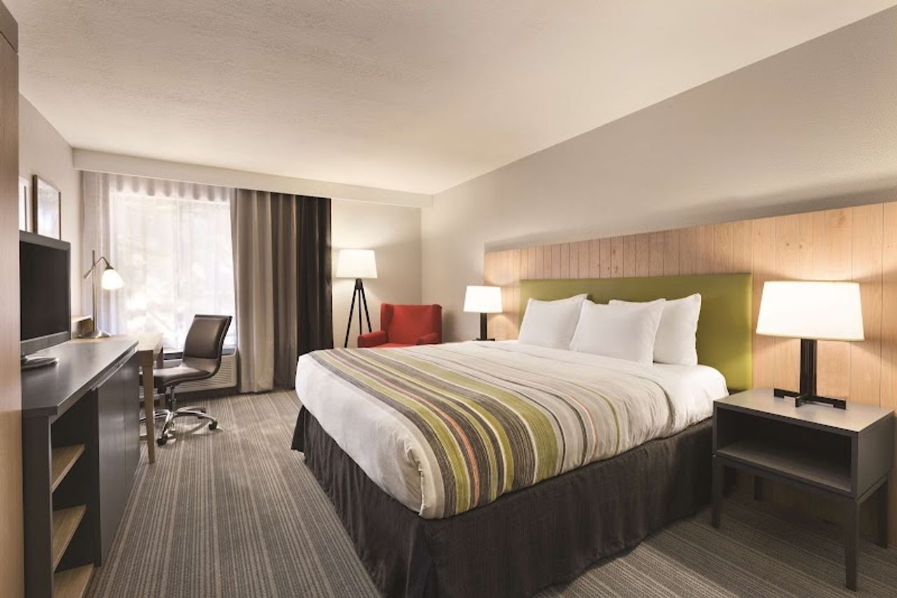 Photo of Country Inn & Suites by Radisson, Monterey Beachfront-Marina, CA - Room, King Bed, Work Desk, Flat TV