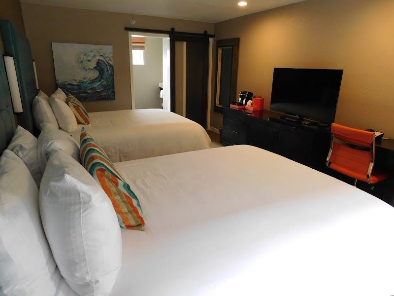 Photo of Wave Street Inn - Cannery Row Queen/Queen a modern room with two queen beds and complimentary Wi-Fi
