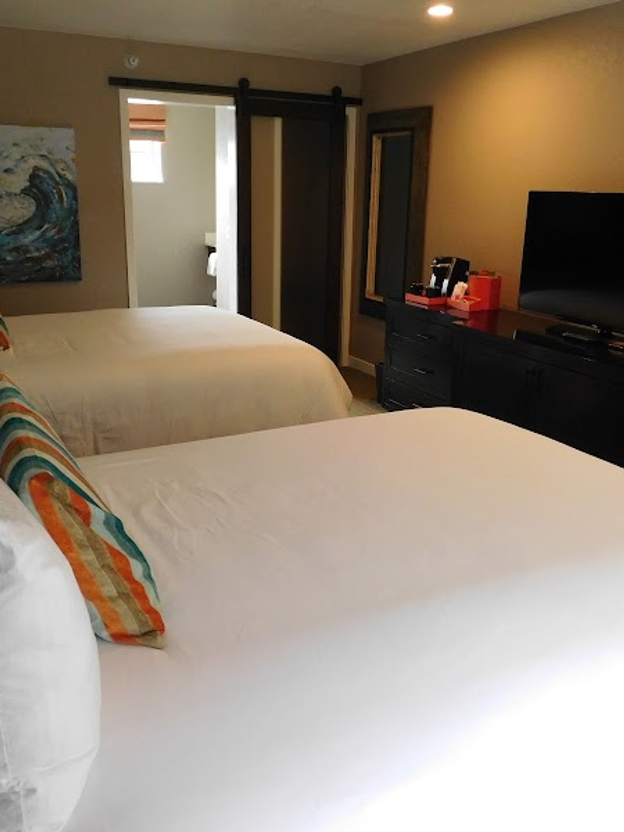 Photo of Wave Street Inn - Cannery Row Queen/Queen a modern room with two queen beds and complimentary Wi-Fi