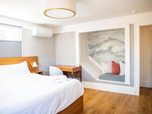 Photo of the compass mcminnville - East suite: first floor, PRIVATE SPA BATHROOM WITH FREESTANDING SOAKING TUB, King bed, COZY READING NOOK WORKING STATION