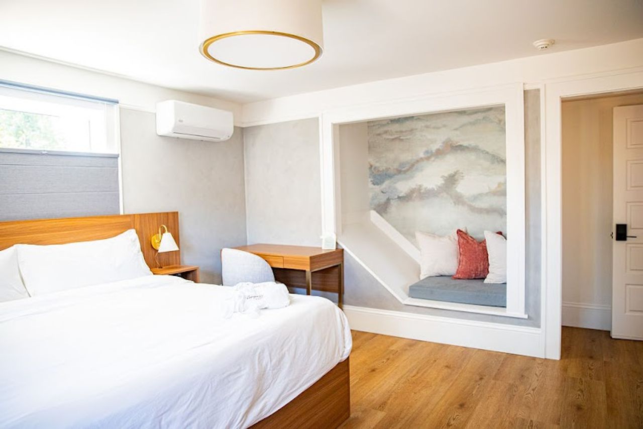 Photo of the compass mcminnville - East suite: first floor, PRIVATE SPA BATHROOM WITH FREESTANDING SOAKING TUB, King bed, COZY READING NOOK WORKING STATION