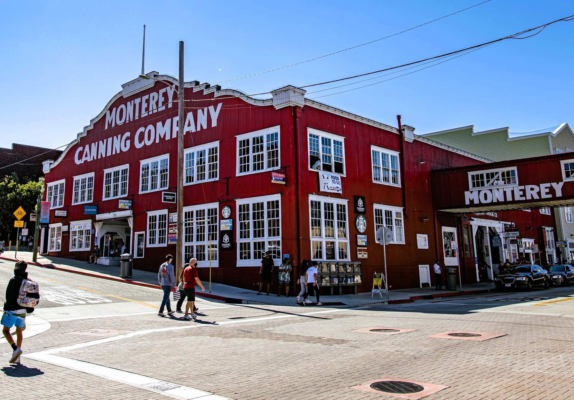 A waterfront street on Cannery Row, Monterey, CA, home to several canning companies, including Monterey Canning Co.