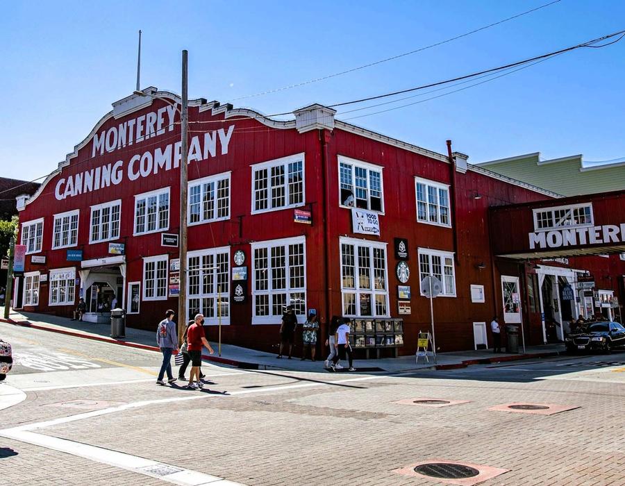 A waterfront street on Cannery Row, Monterey, CA, home to several canning companies, including Monterey Canning Co.