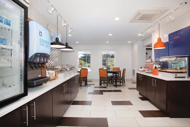 Photo of Holiday Inn Express - Complimentary hot breakfast with sweet pastries