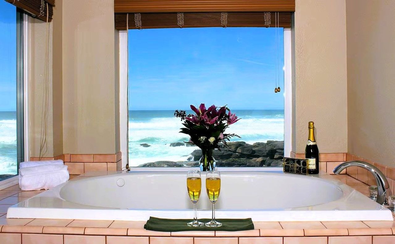 Photo of Overleaf Lodge - Private whirlpool tubs with ocean views