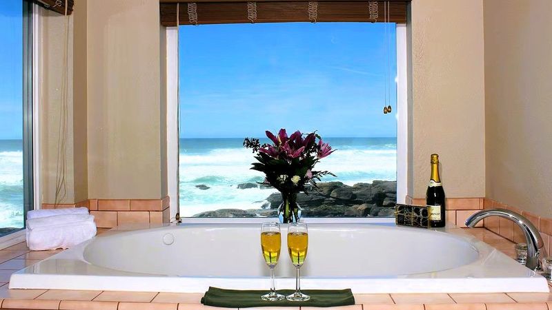 Photo of Overleaf Lodge - Private whirlpool tubs with ocean views
