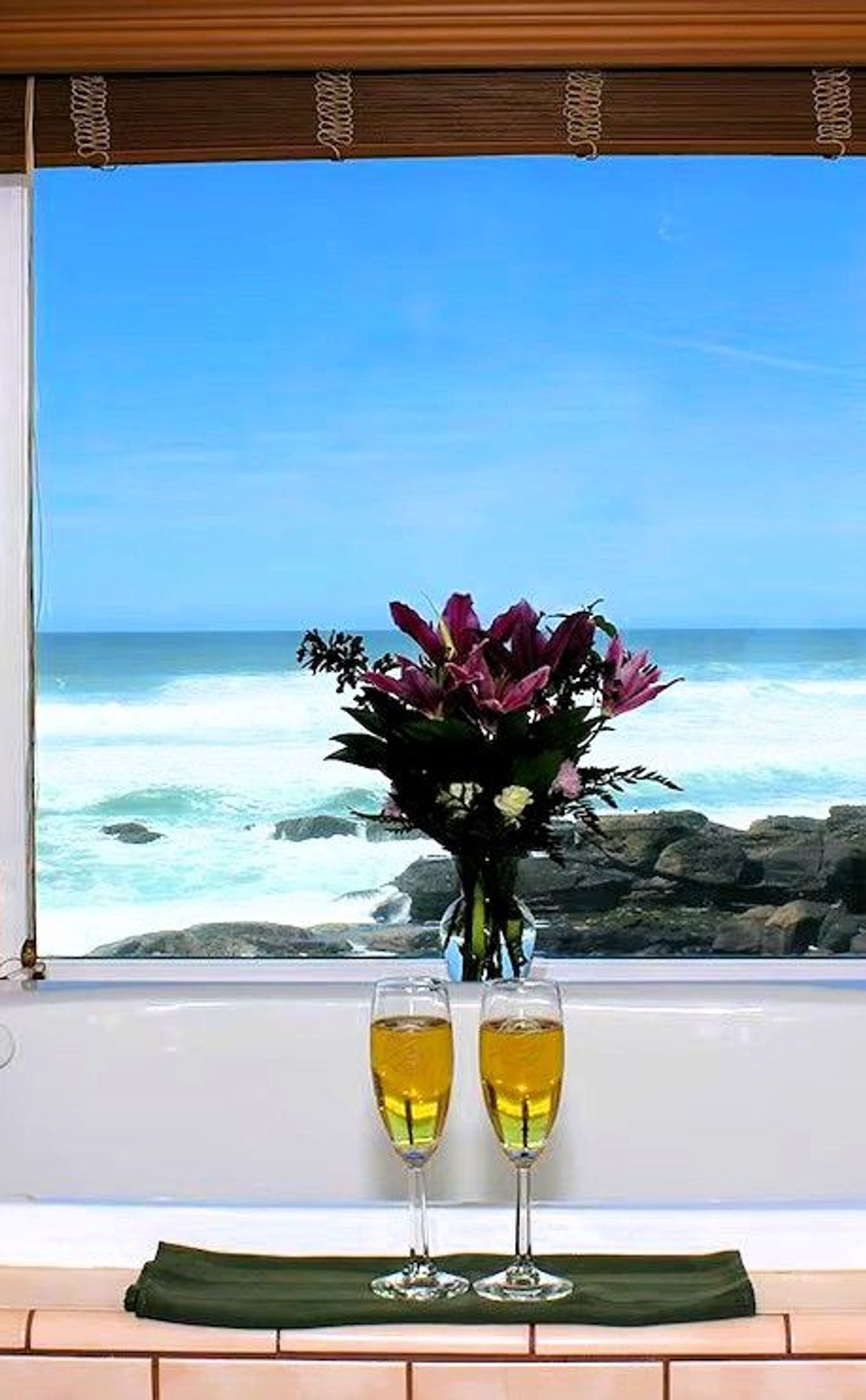 Photo of Overleaf Lodge - Private whirlpool tubs with ocean views