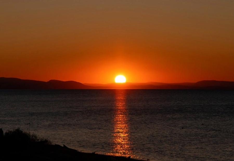 Sunset over the Gulf Islands, taken from the beach at Semiahmoo, Douglas, Blaine, Washington, USA