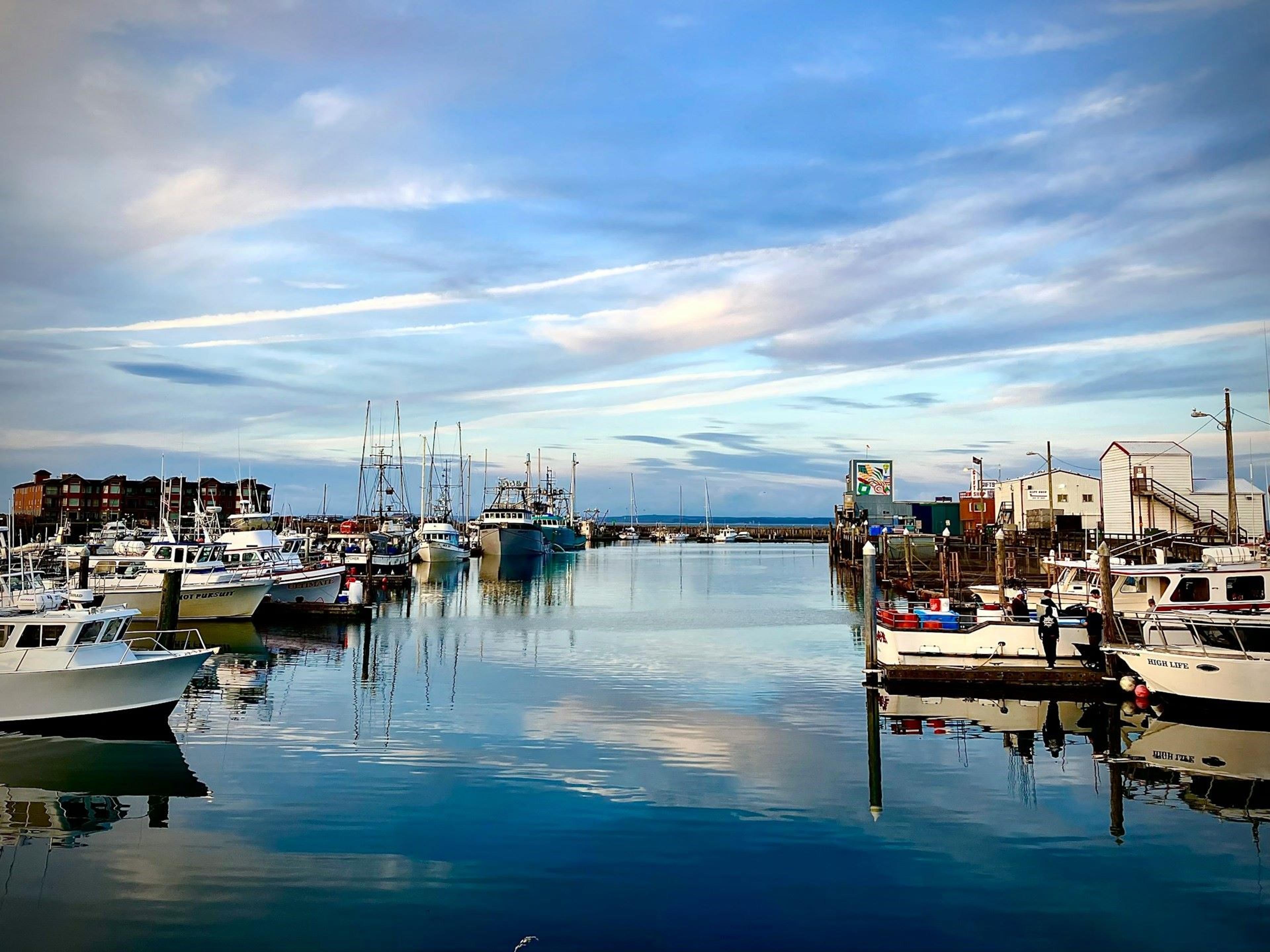 A mixed use marina in Westport, Washington at sunset