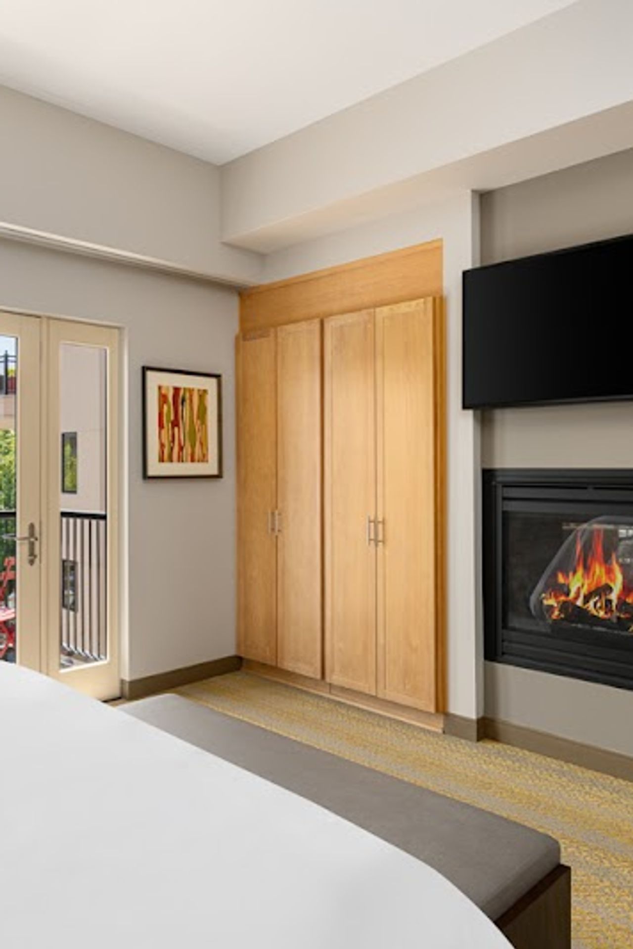 Photo of Inn at the 5th Eugene - Suite, Separate bedroom and living area, King Bed, Fireplace, Private terrace
