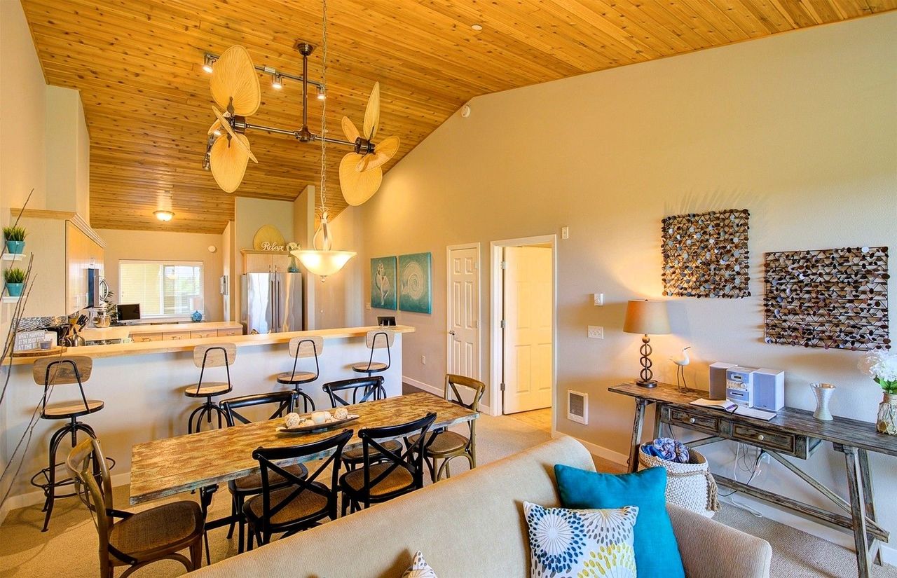 Photo of Oyhut Bay Seaside Resort - Condo 405 Siren's Serenity Condominium - Living room area, Full kitchen