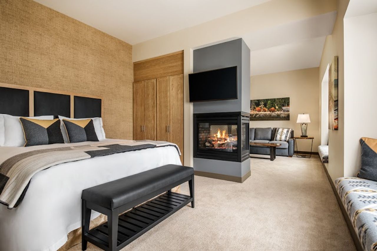 Photo of Inn at the 5th Eugene - Suite, Separate bedroom and living area, King Bed, Fireplace