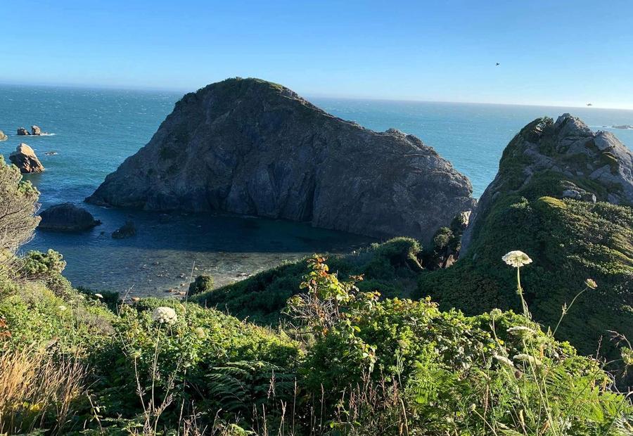 View of the cove at Harris Beach State Park from the highway looking over the Pacific ocean near Brookings and Harbor, Oregon
